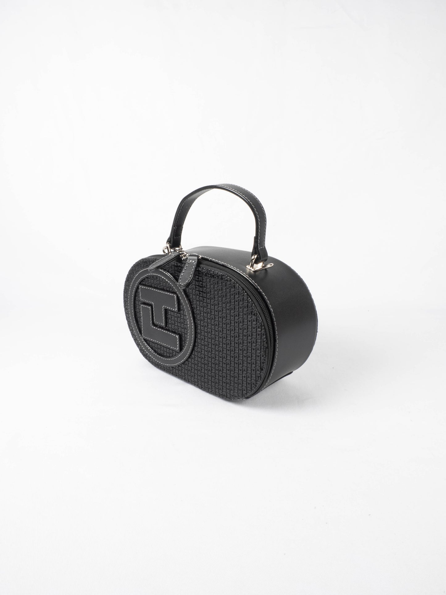 Sac à main Ted Lapidus Fidelio pilule en cuir noir avec logo