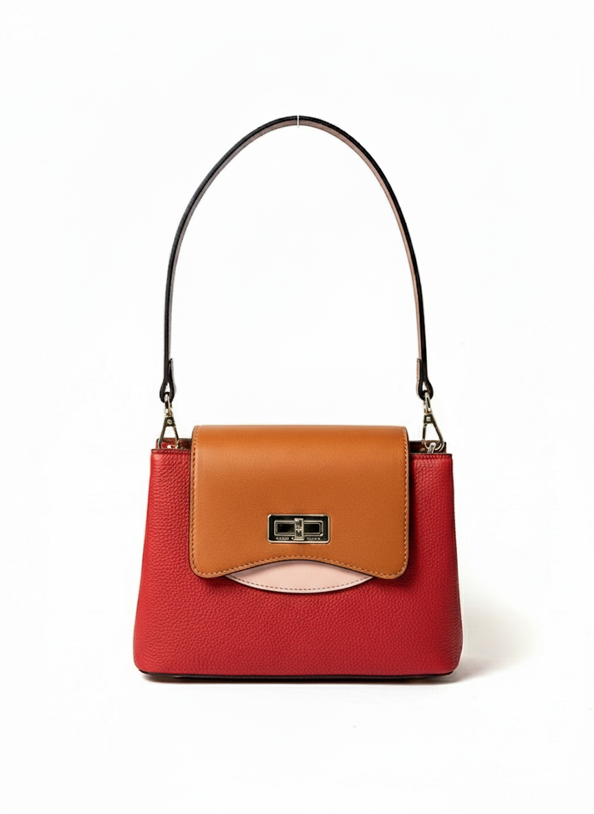 sac rouge ted lapidus porté à l'épaule fermoir doré rotatif couleur marron rose rouge