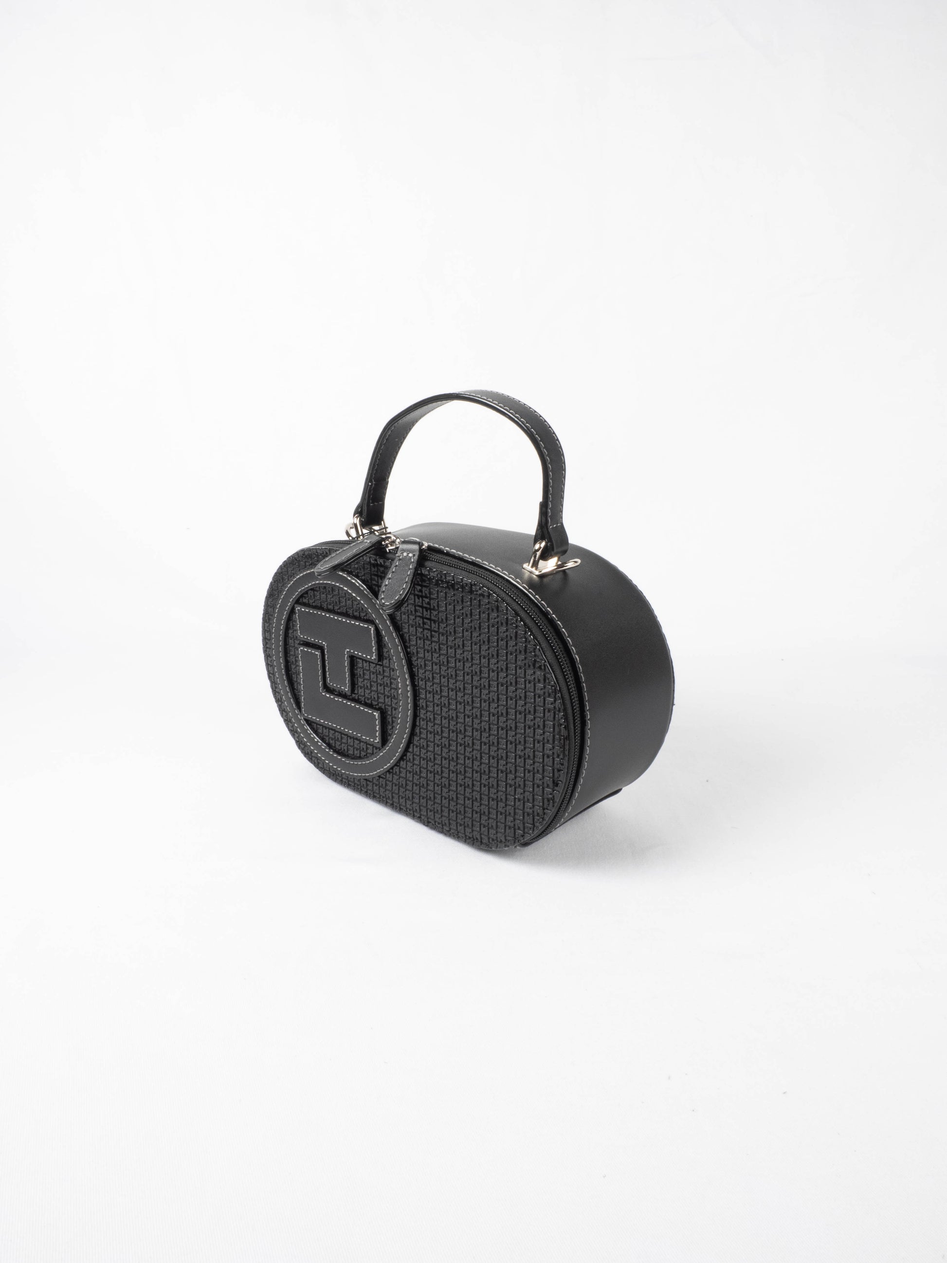 Sac à main Ted Lapidus Fidelio pilule en cuir noir avec logo