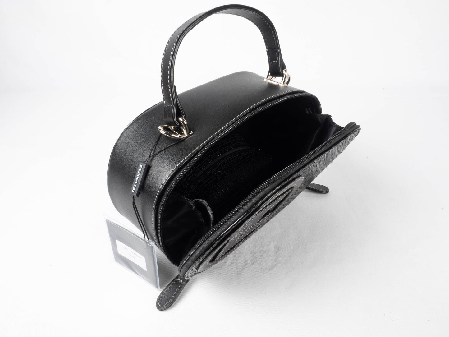 Sac à main Ted Lapidus Fidelio pilule en cuir noir ouvert